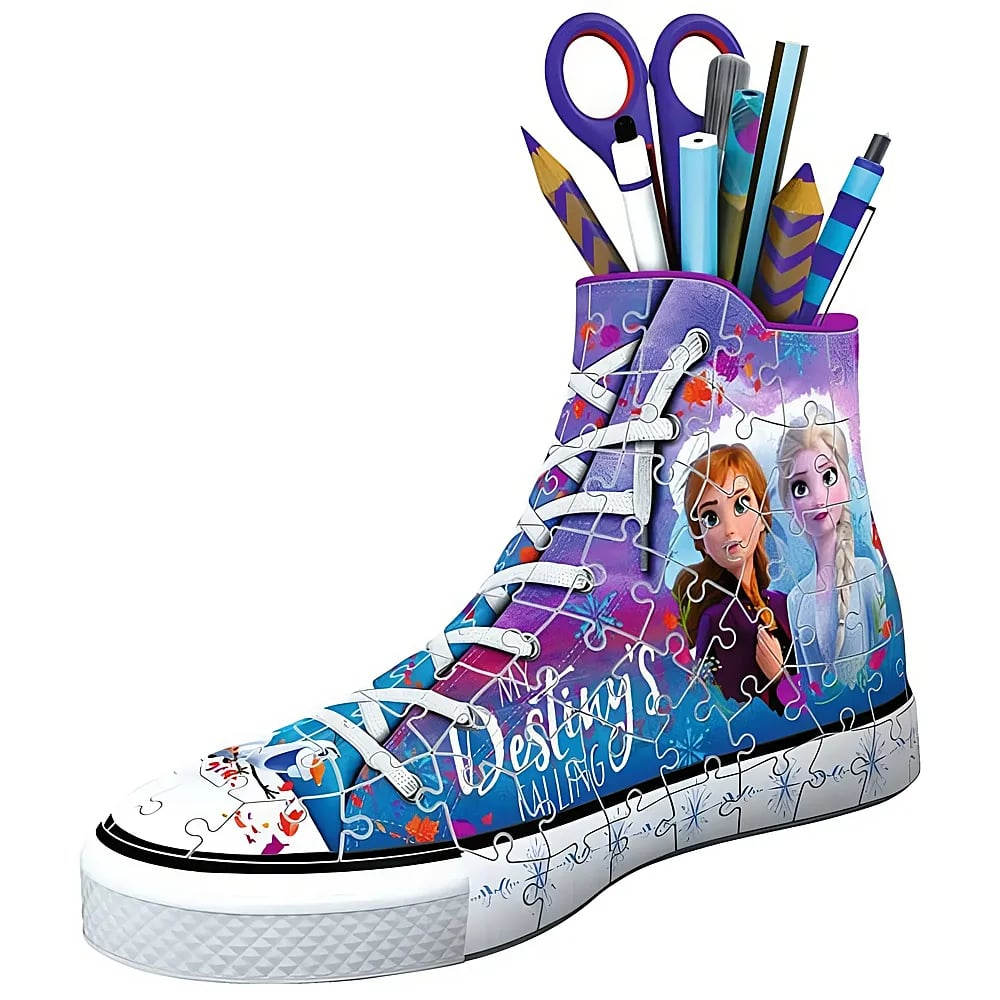 Ein lilafarbener Sneaker als Stiftehalter mit Anna und Elsa aus Frozen, gefüllt mit Schreibwaren.