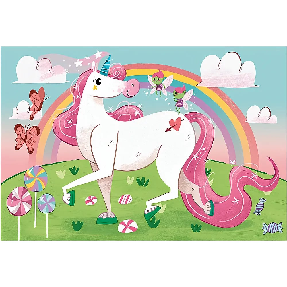 Un unicorno bianco con criniera rosa si trova su un prato verde davanti a un arcobaleno e nuvole.