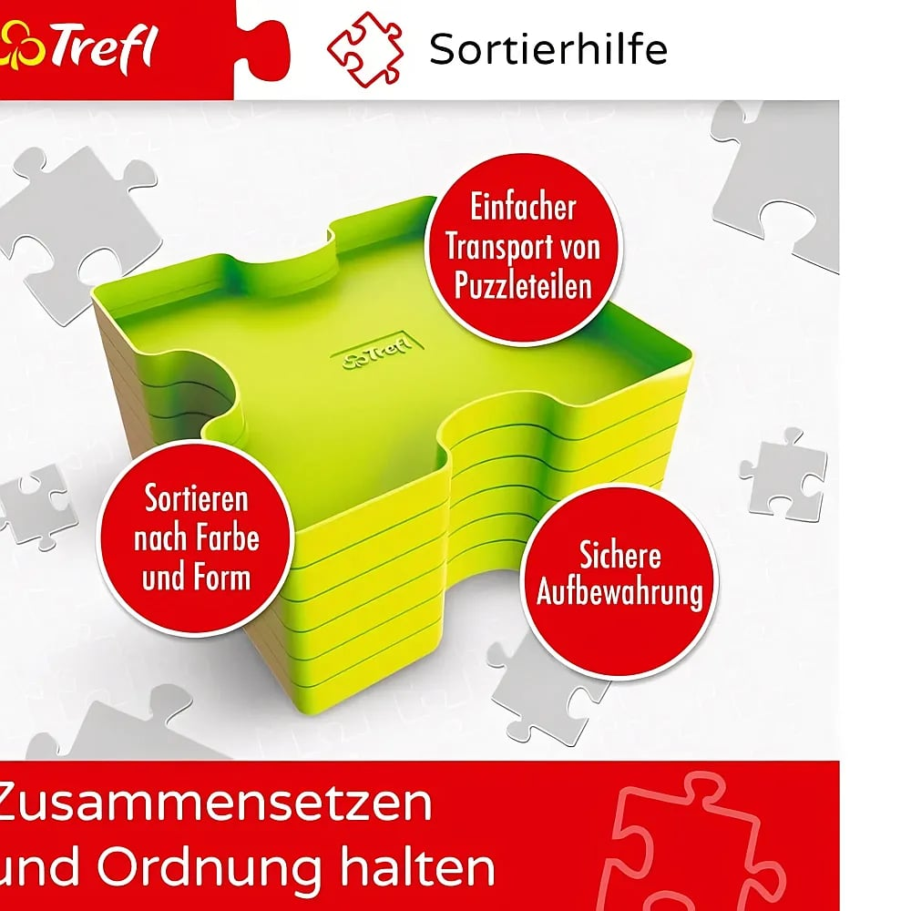 Stapelbare grüne Puzzleteile-Sortierboxen von Trefl mit erklärenden roten Kreisen.