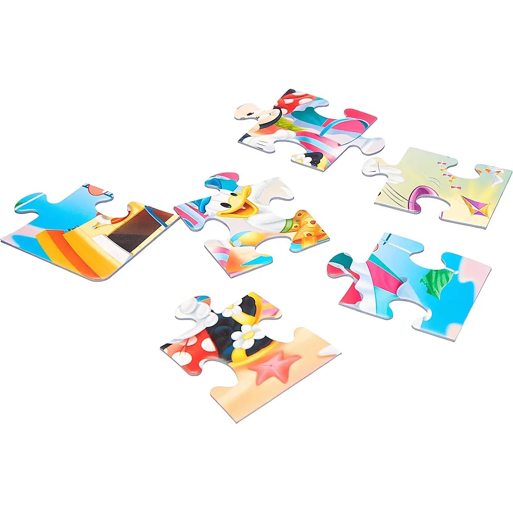 Sechs bunte Disney-Puzzleteile liegen auf einem weißen Hintergrund verstreut.
