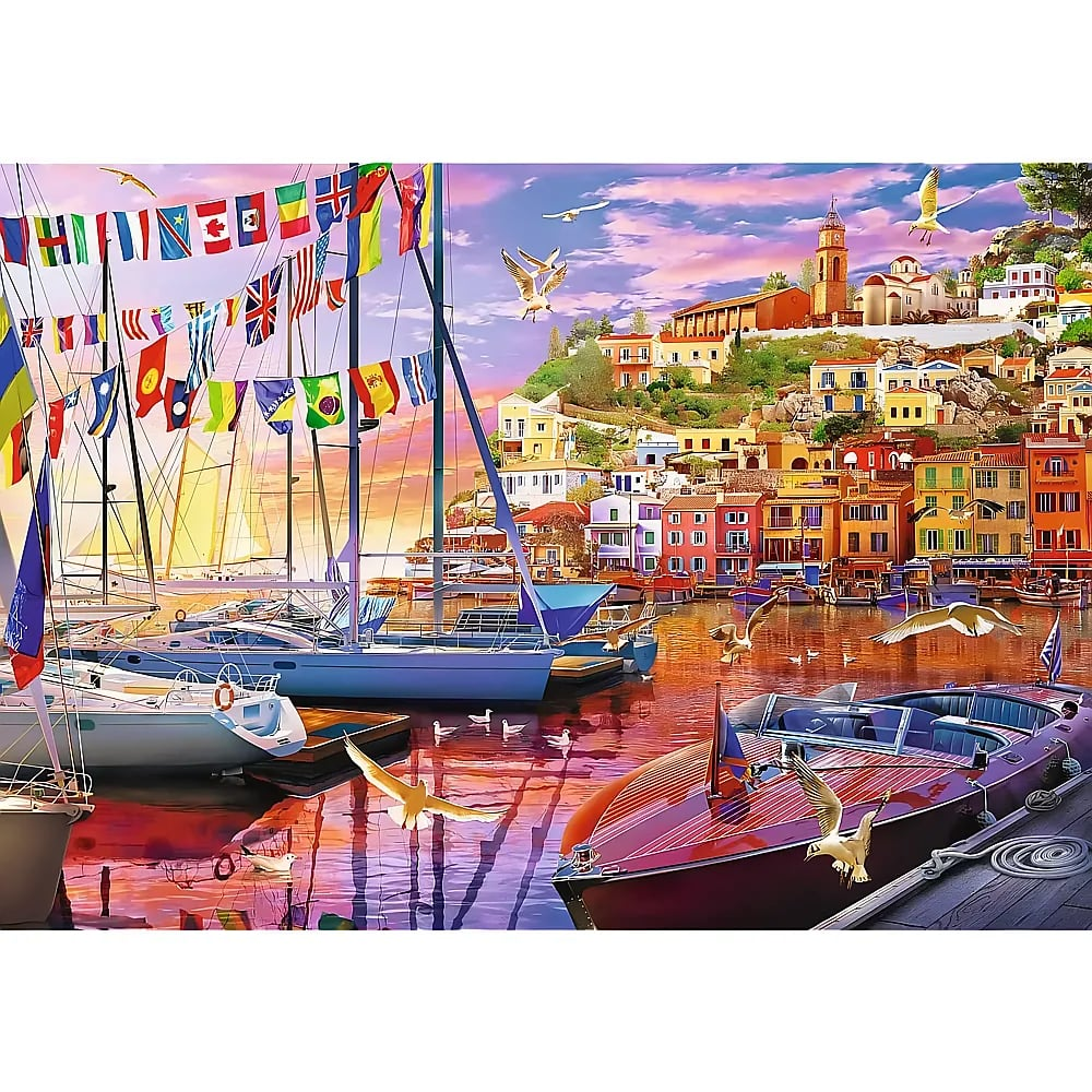 A vibrant harbor filled with boats and colorful flags fluttering, against a scenic coastal town backdrop at sunset.