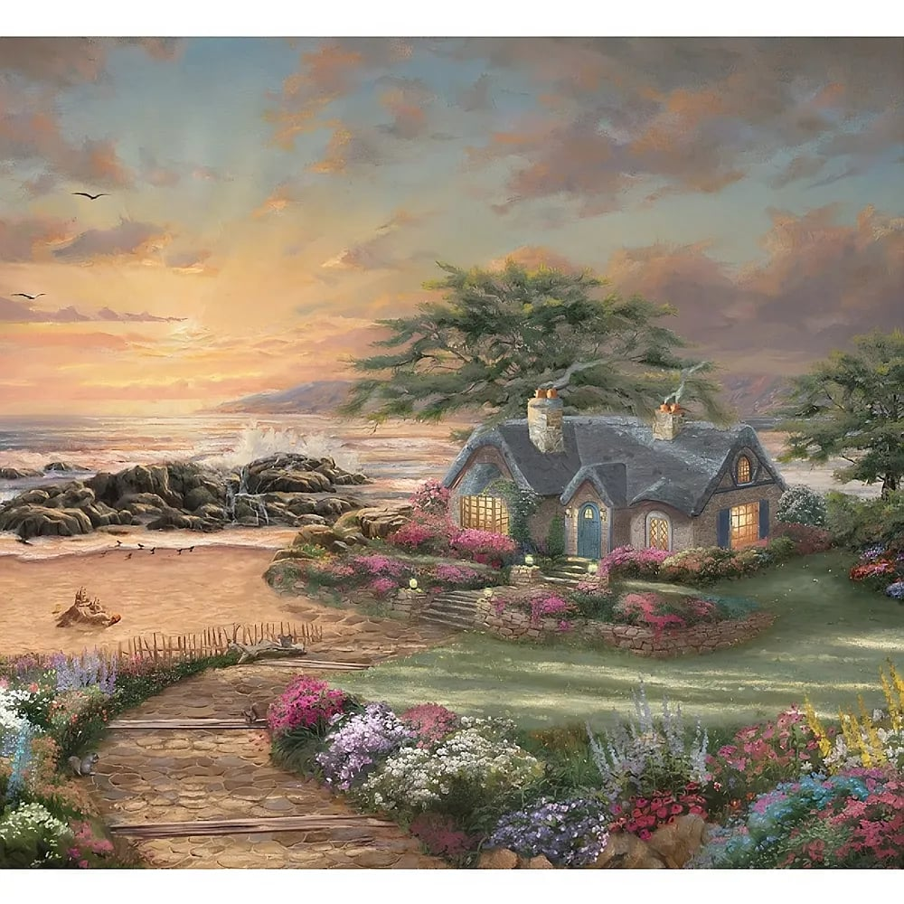 Un pittoresco cottage sul mare al tramonto con un sentiero fiorito in primo piano.
