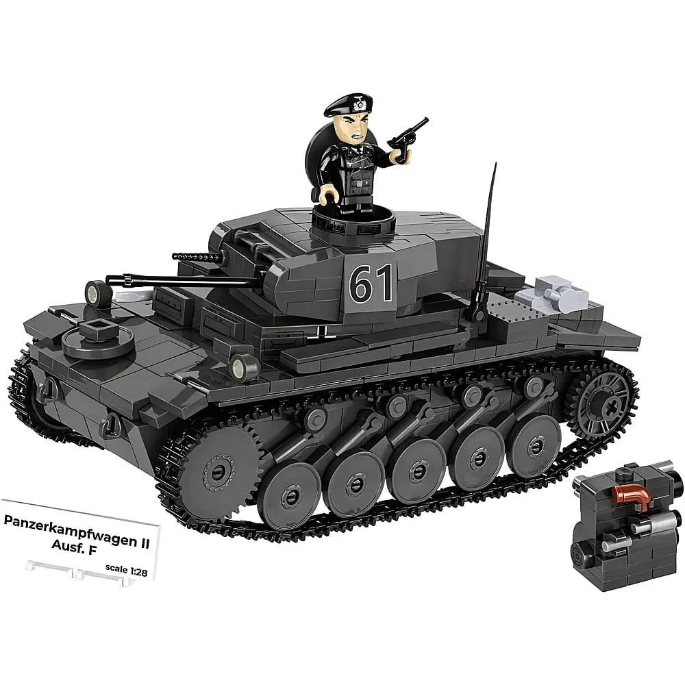 Ein schwarzer Spielzeugpanzer aus Bausteinen mit einer Figur mit Mütze in der Luke, die eine Pistole hält.