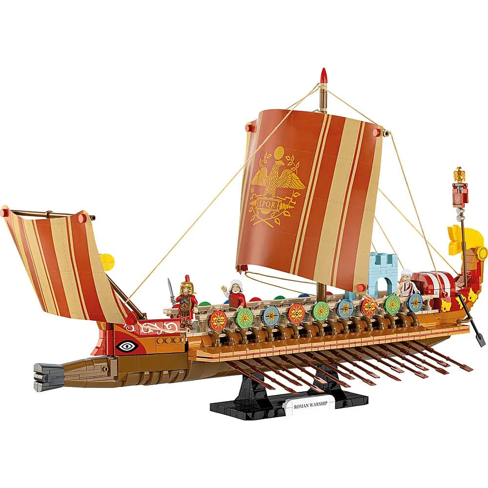 Modèle réduit détaillé d'un navire de guerre romain avec rames, voiles rouges et jaunes et figurines.