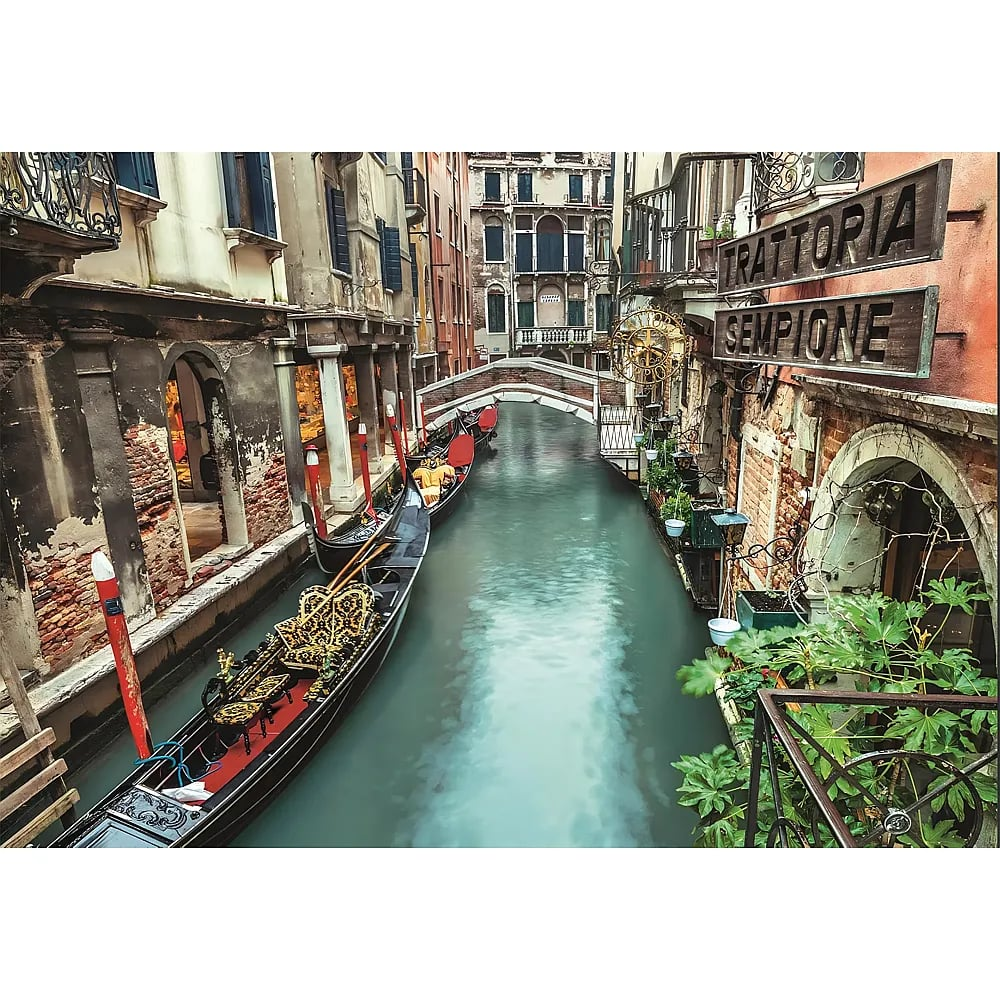 Venice canal with moored gondolas, old buildings, a small bridge, and a Trattoria Sempione sign on the right.