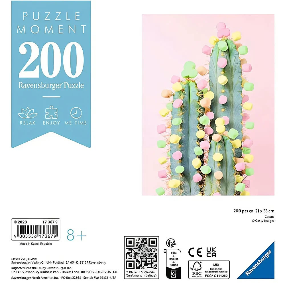 Ravensburger Puzzle-Box mit blauem Label und Kaktus verziert mit bunten Marshmallows vor rosa Hintergrund.