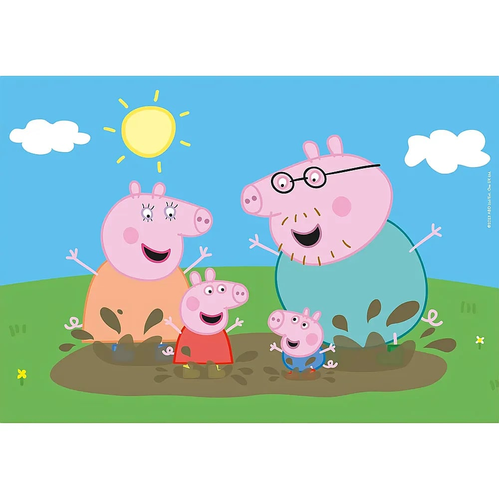 Peppa Pig y su familia saltan alegres en un charco de barro, bajo un sol brillante y un cielo azul con hierba verde.
