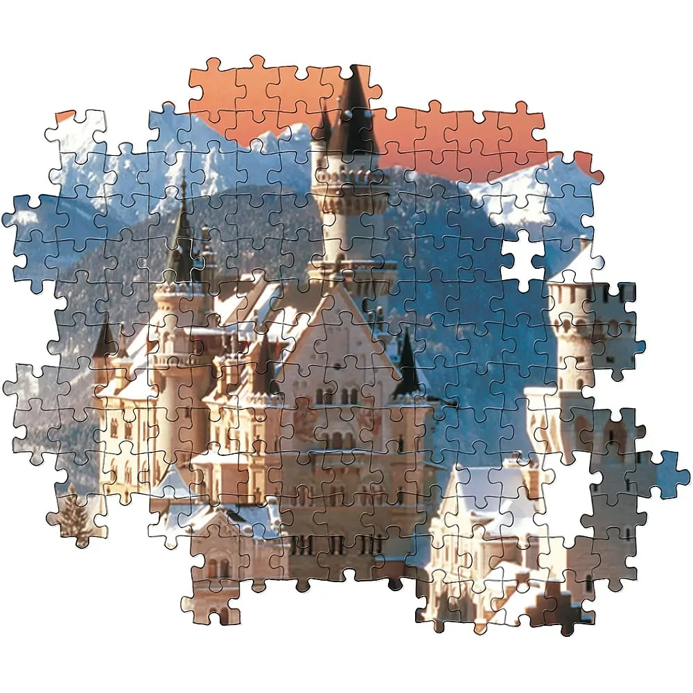 An incomplete jigsaw puzzle depicts the snowy Neuschwanstein Castle before mountains.