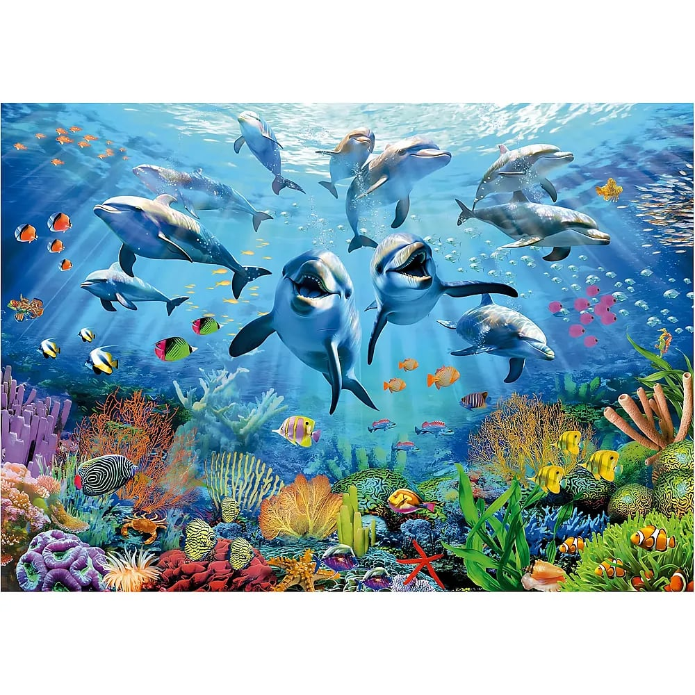 Una vibrante escena submarina con muchos delfines, peces coloridos y arrecifes de coral en agua azul.