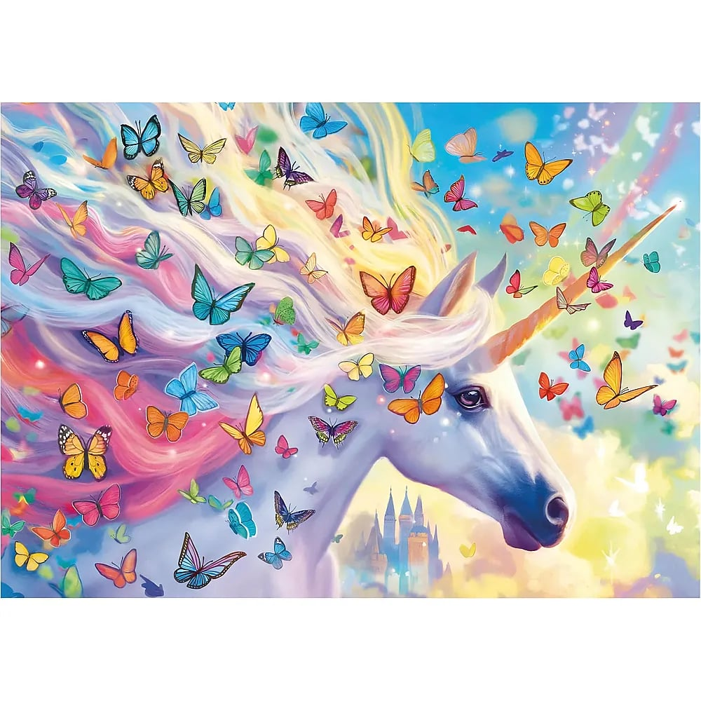 Ein weißes Einhorn mit Regenbogenmähne und vielen bunten Schmetterlingen vor einem Schloss und blauschimmerndem Himmel.