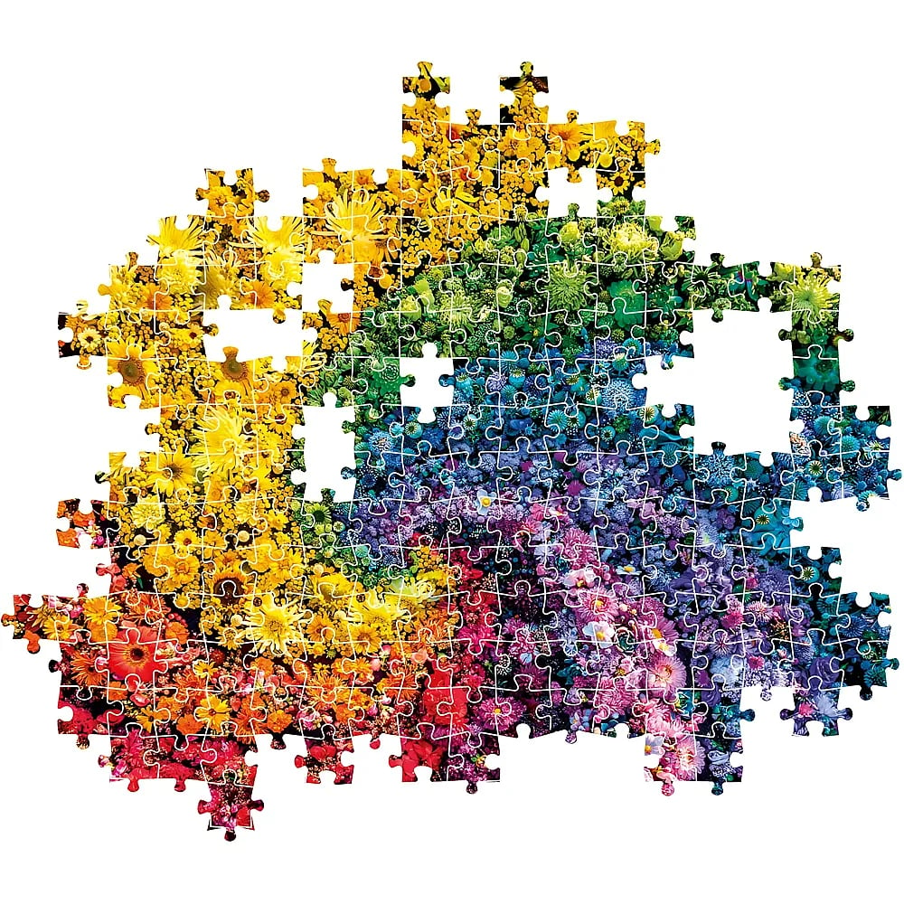Un rompecabezas armado con un degradado vibrante de flores, que pasa de amarillo a verde, azul y rojo.