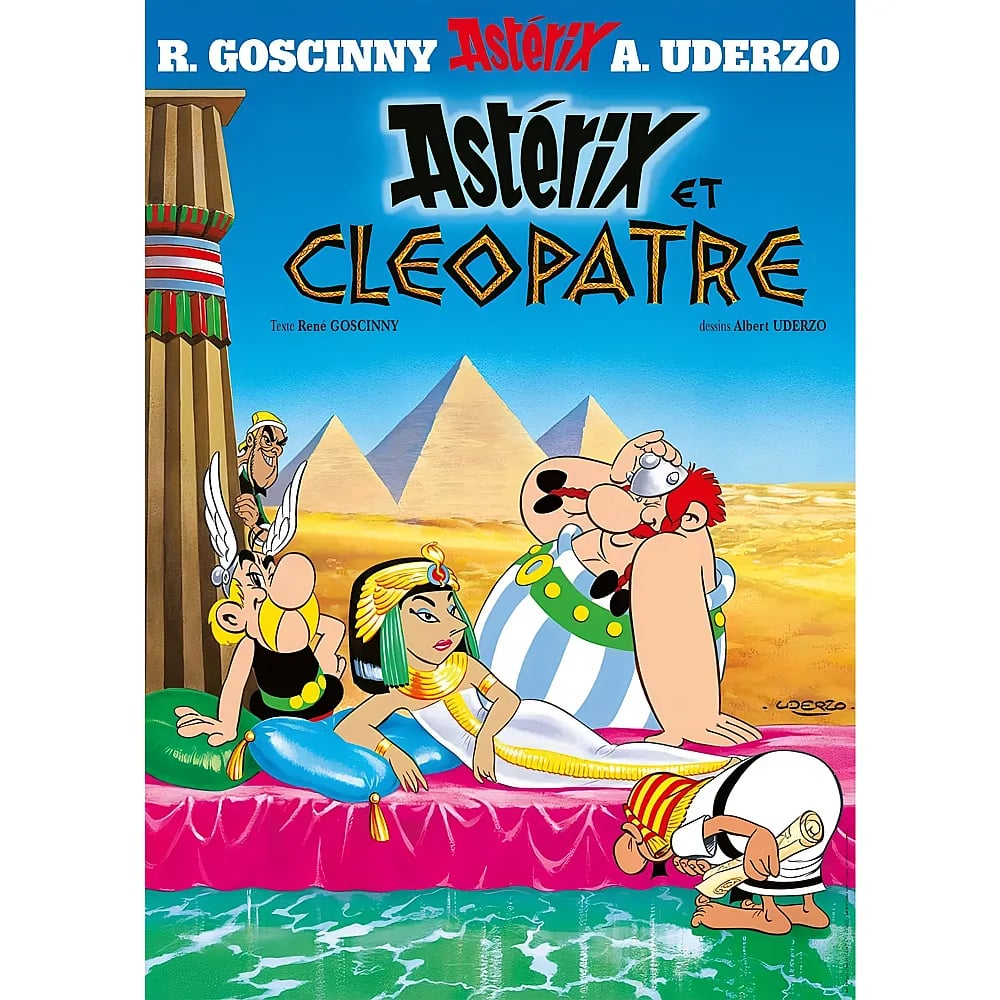 Comic-Cover mit Asterix, Cleopatra und Obelix vor ägyptischen Pyramiden und einer Säule unter blauem Himmel.