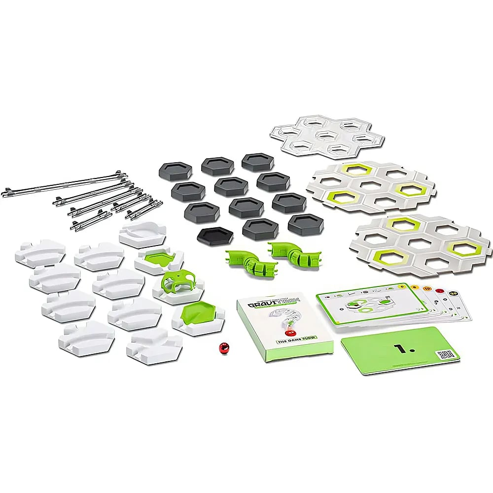 Ein GraviTrax Kugelbahn-Set mit grauen und grünen Bauteilen, hexagonalen Platten, Schienen, Karten und einer roten Kugel.