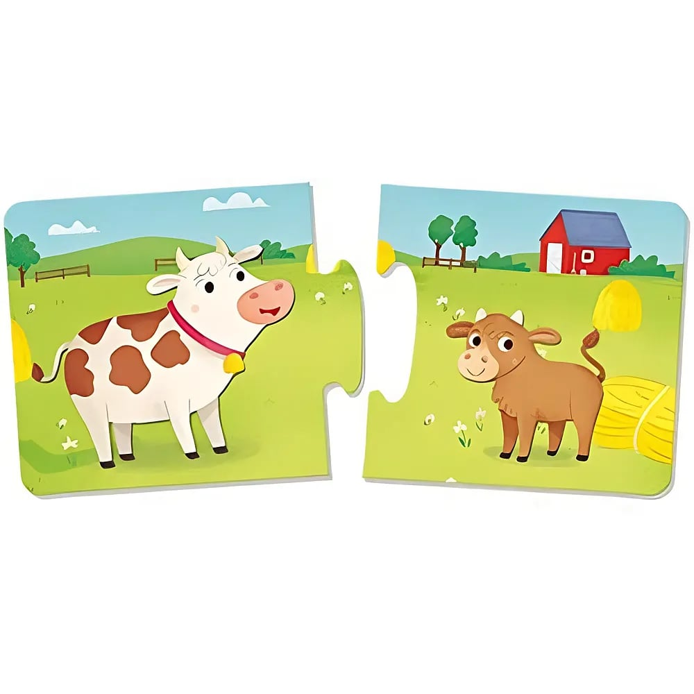 Zwei Puzzleteile mit Bauernhofszenen zeigen eine Kuh und ein Kalb vor einer Wiese und einer Scheune.