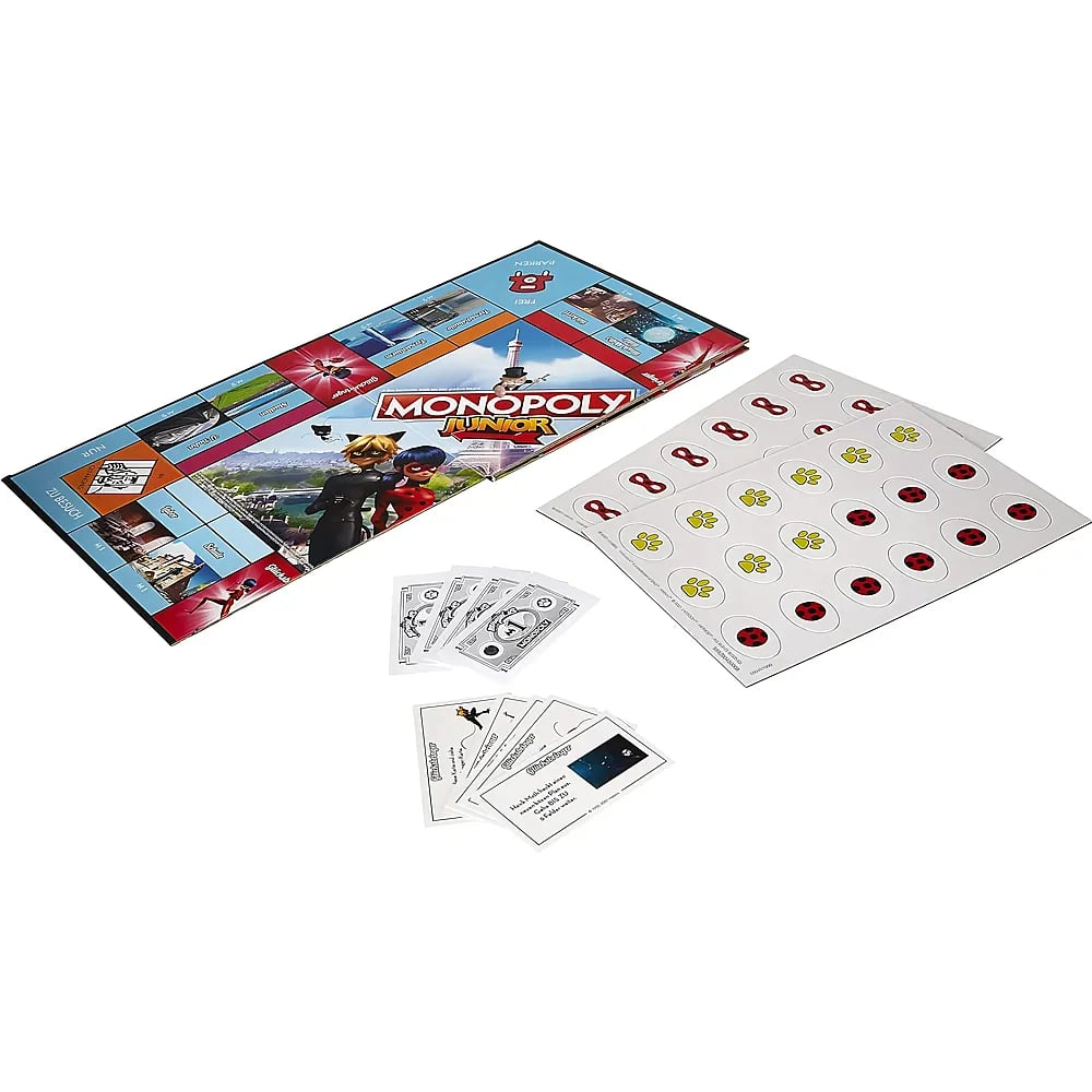 Ein Monopoly Junior Brettspiel mit Spielgeld, Karten und Spielfeldern im Miraculous-Design vor weißem Hintergrund.
