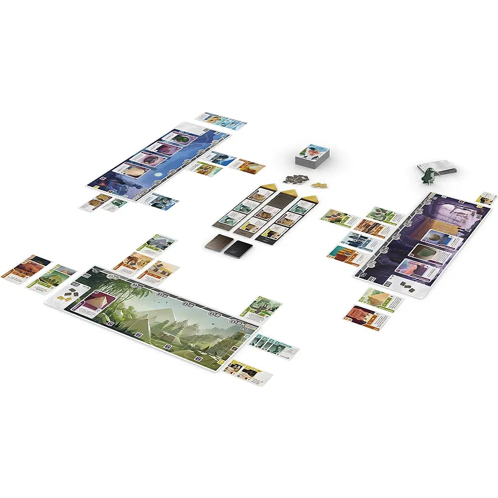 Ein Brettspiel-Setup mit bunten Brettern, Karten und Markierungen auf einer weißen Oberfläche.