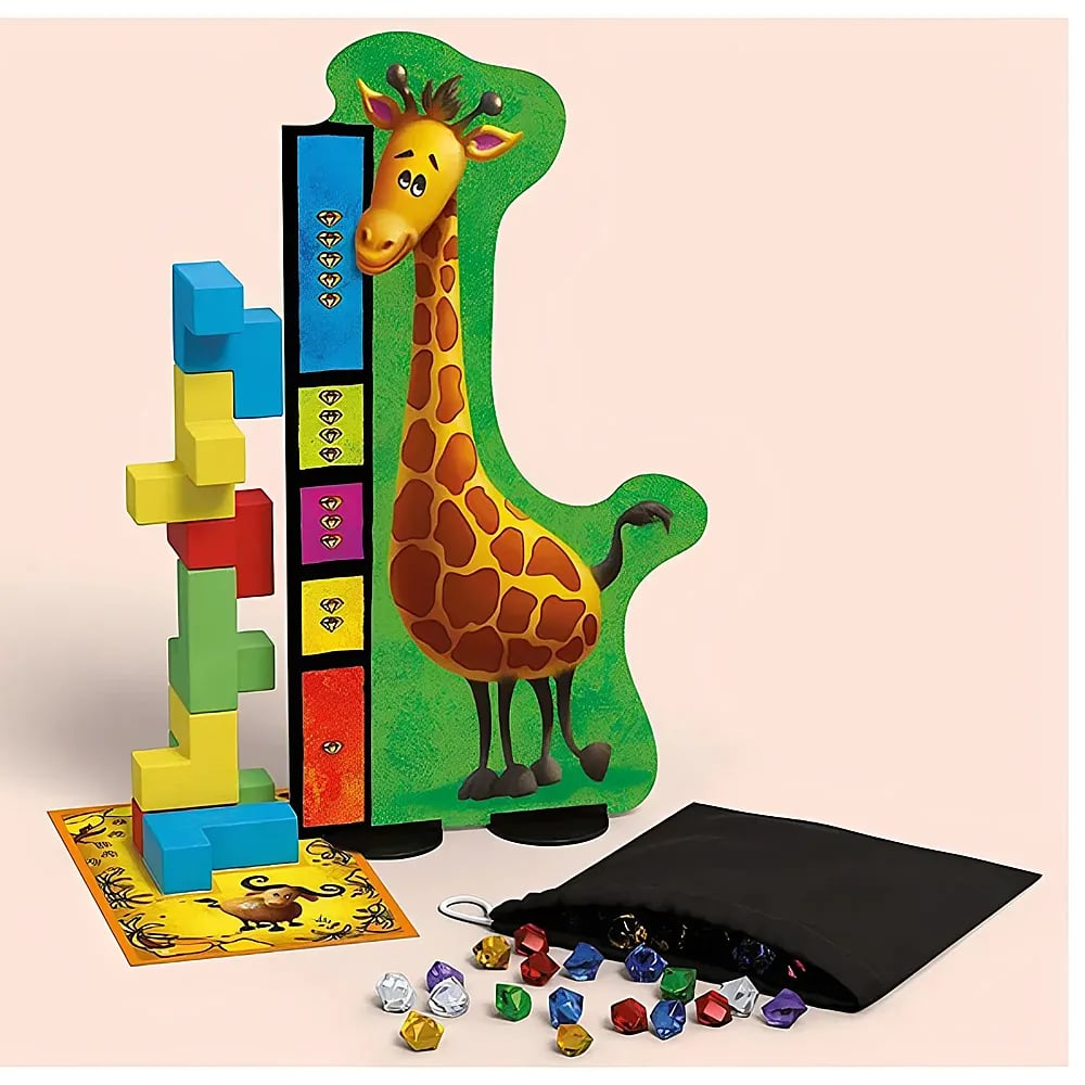Ein Giraffen-Spielbrett, ein farbiger Holzturm, ein schwarzer Beutel und bunte Edelsteine liegen auf einem Tisch.