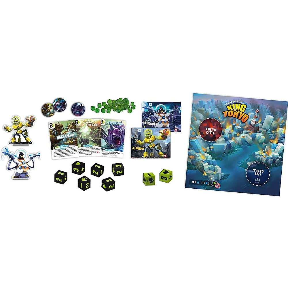 Jeu de plateau King of Tokyo avec cartes, figurines, dés verts et noirs, et un plan de ville.
