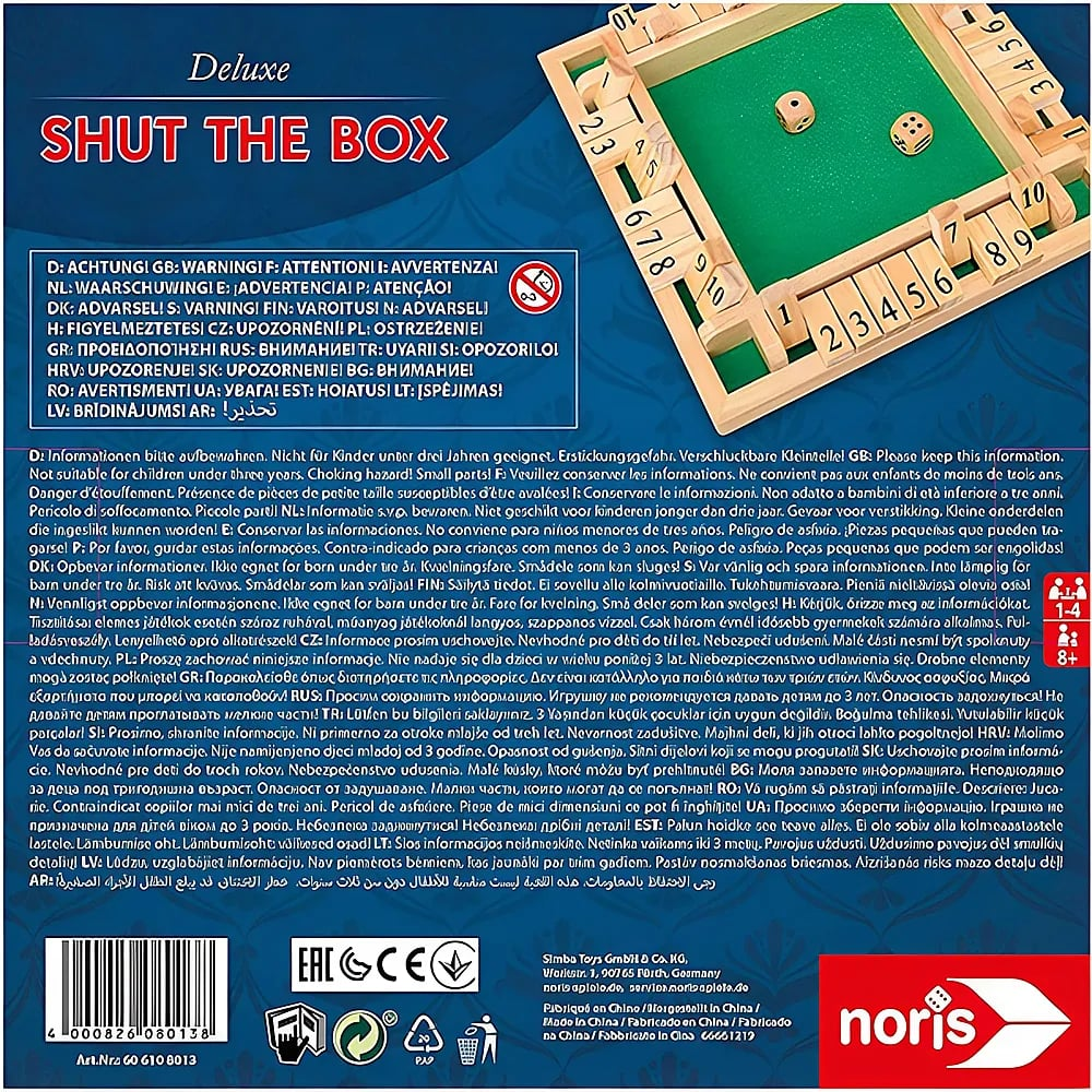 Dos de la boîte du jeu de dés Shut the Box avec avertissements et pions.