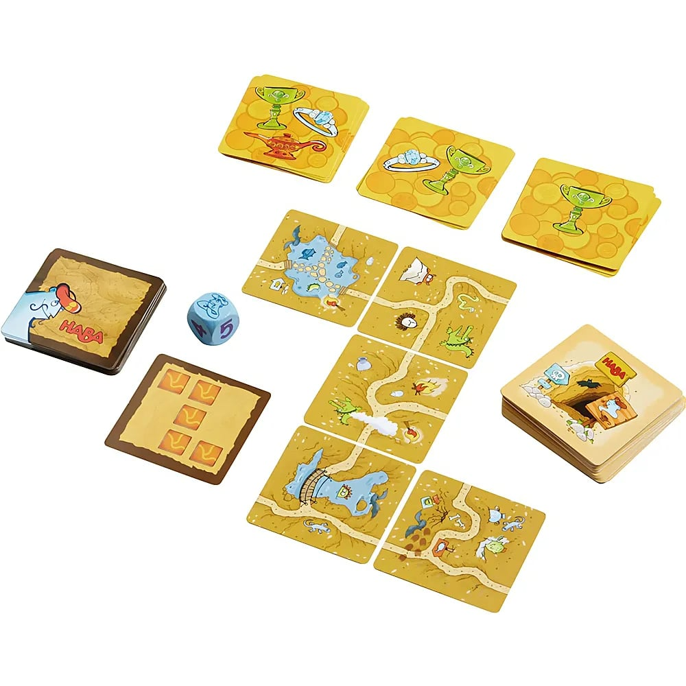 Ein Tisch zeigt ein Haba-Brettspiel mit quadratischen Bildkarten, einer blauen Würfelzahl und verschiedenen Suchstapeln.