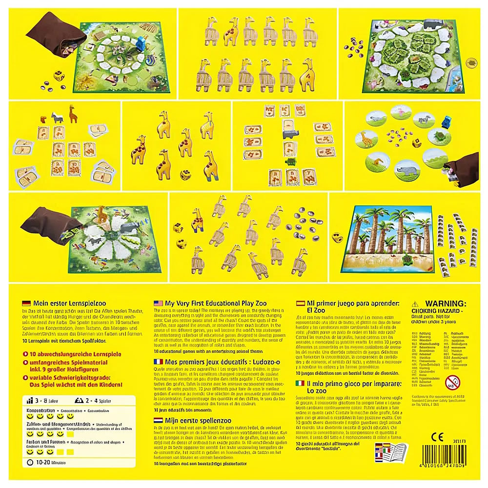 Blick auf das bunte Brettspiel mit Holzfiguren und Spielkarten.