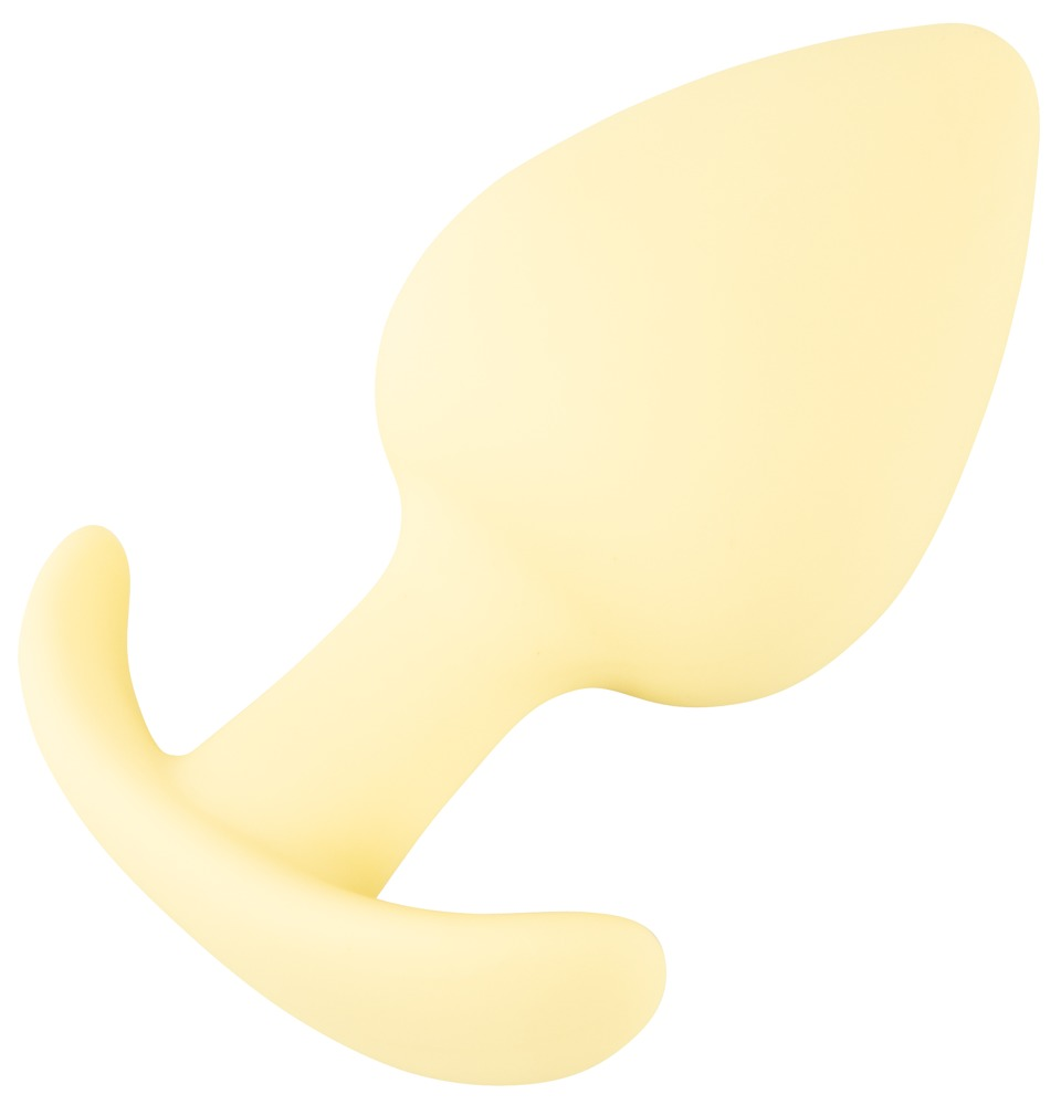Ein hellgelber Butt Plug aus Silikon mit einem breiten Fuß auf weißem Hintergrund.