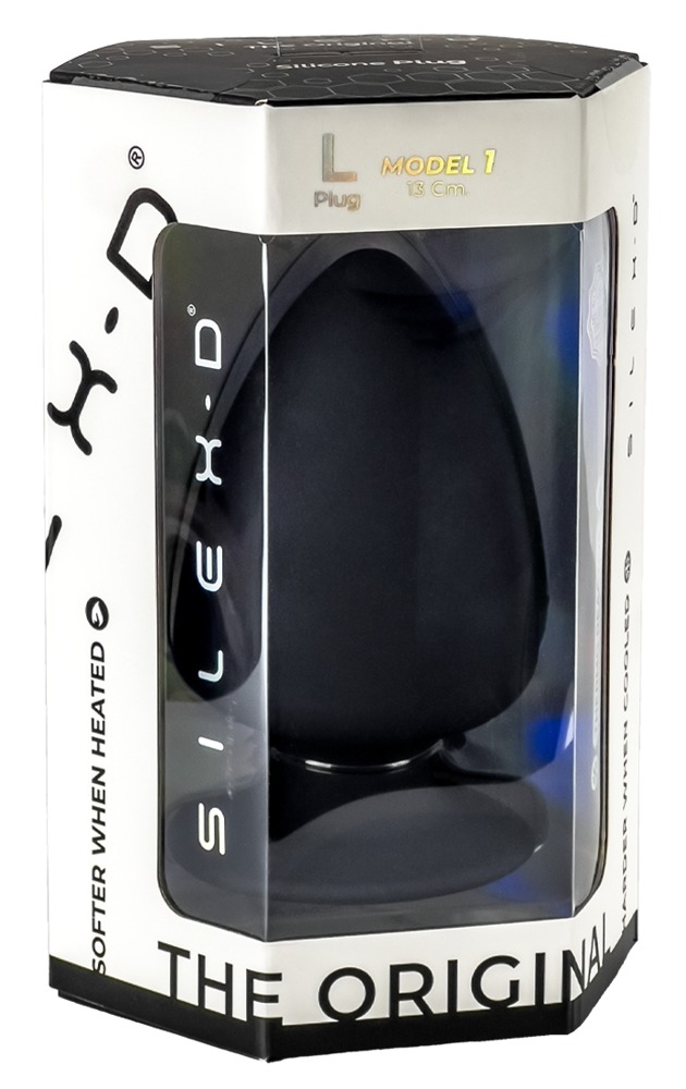 Ein schwarzer Silikon-Plug, Modell 1, in seiner weiß-schwarzen Verpackung.