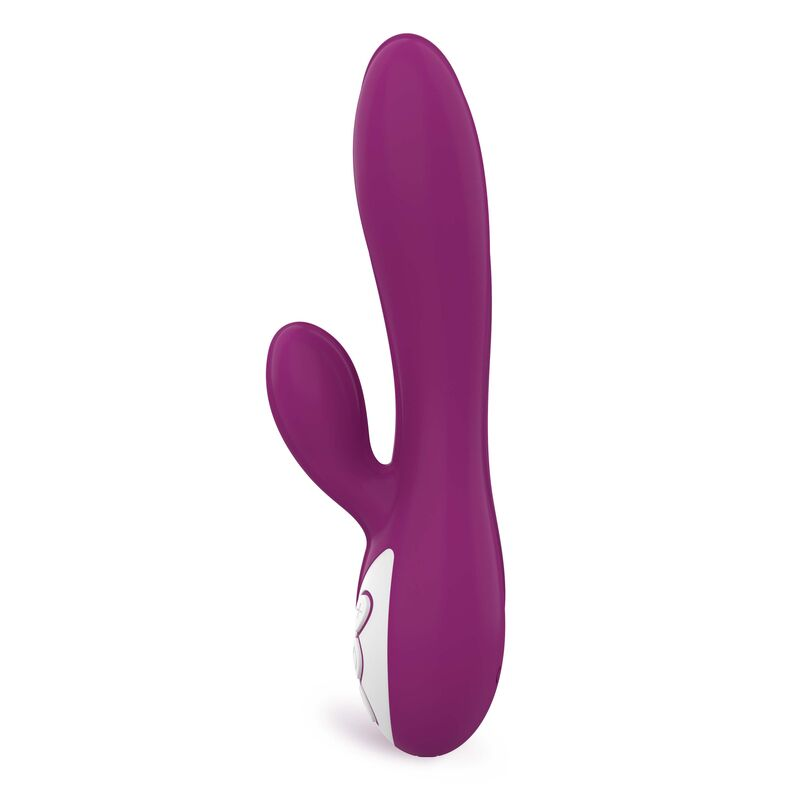 Lila vibrierendes Dildo-Spielzeug auf weißem Hintergrund.