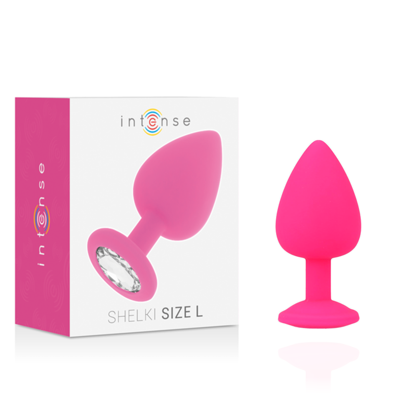 Ein pinker Analplug mit glitzerndem Steinchen am Boden daneben eine weiße und pinke Produktverpackung.