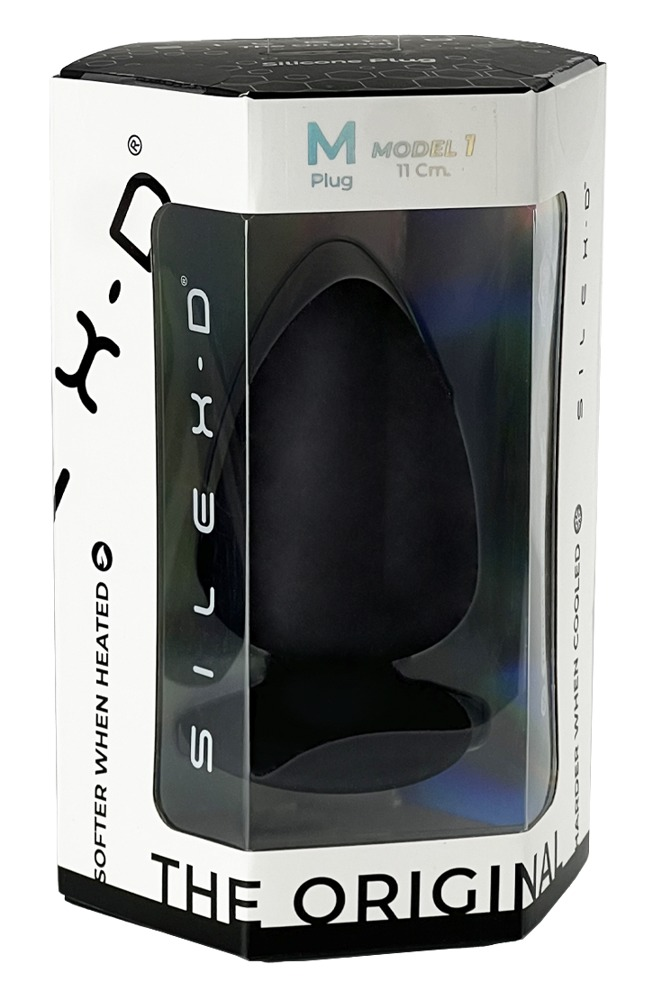Ein schwarzer Silikon-Plug in einer weiß-schwarzen Verpackung.