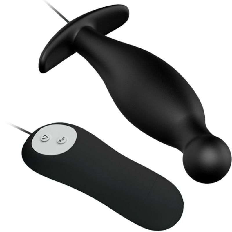 Ein schwarzes Wellnessprodukt mit T-förmigem Griff und runder Spitze, daneben eine Fernbedienung.