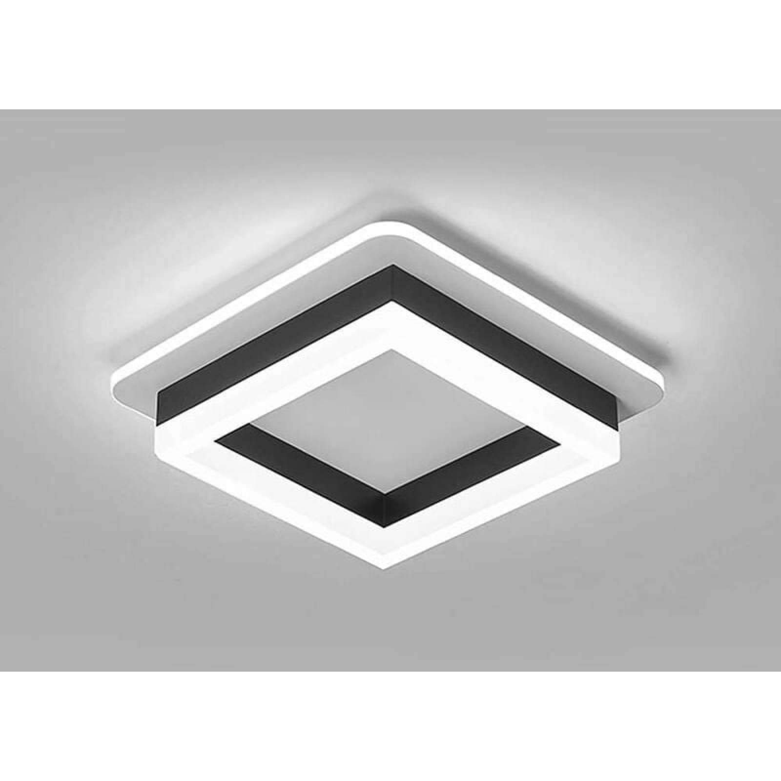 Moderne quadratische Deckenlampe in Schwarz und Weiß an grauer Decke.