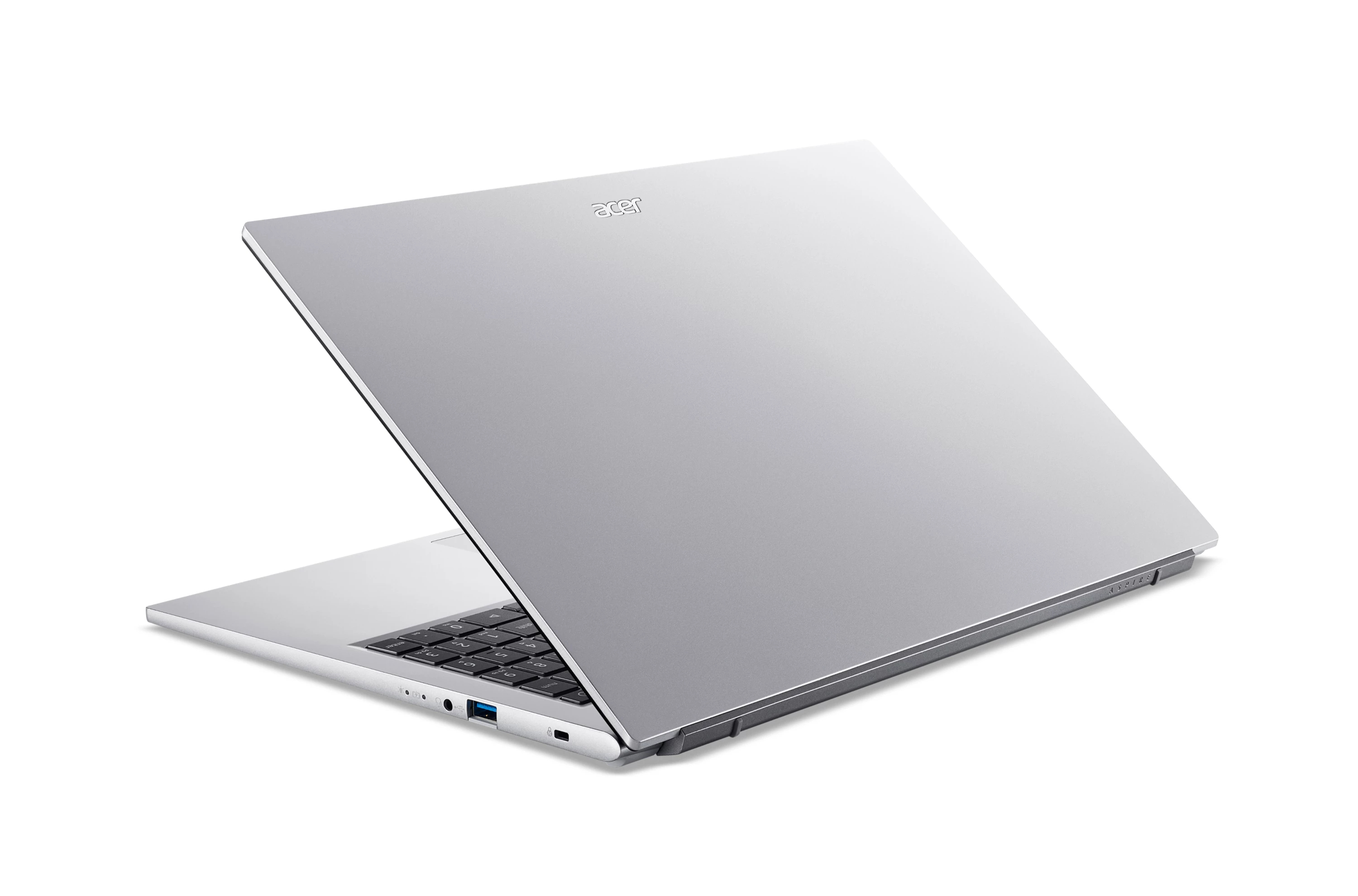Un laptop Acer argentato è leggermente aperto su sfondo bianco, mostrando tastiera e porte laterali.