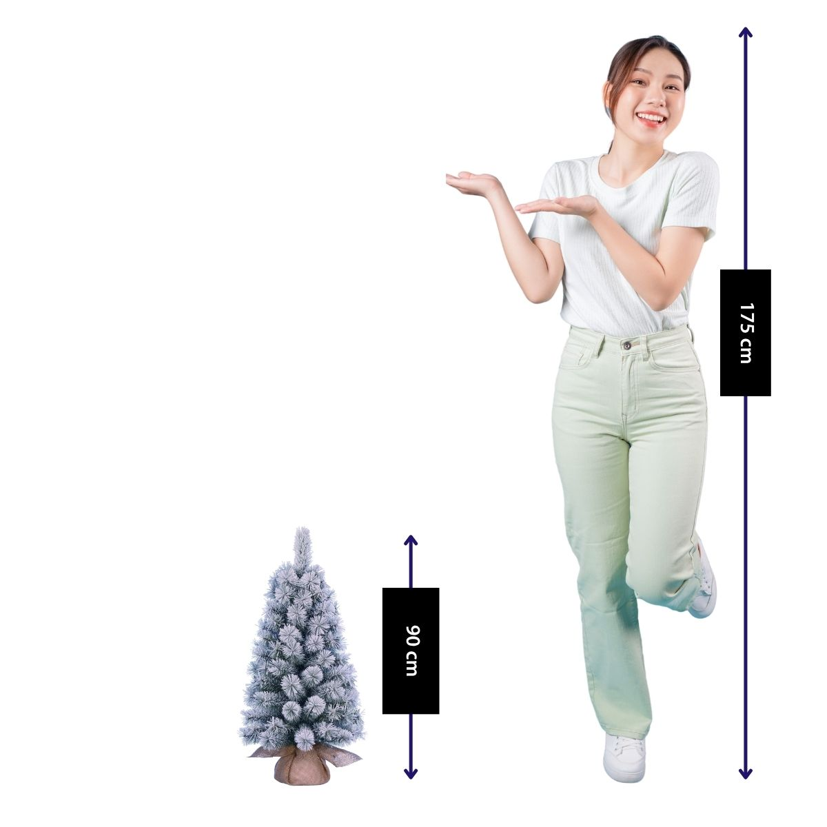 A woman presents a small, 90 cm artificial Christmas tree next to her 175 cm height.