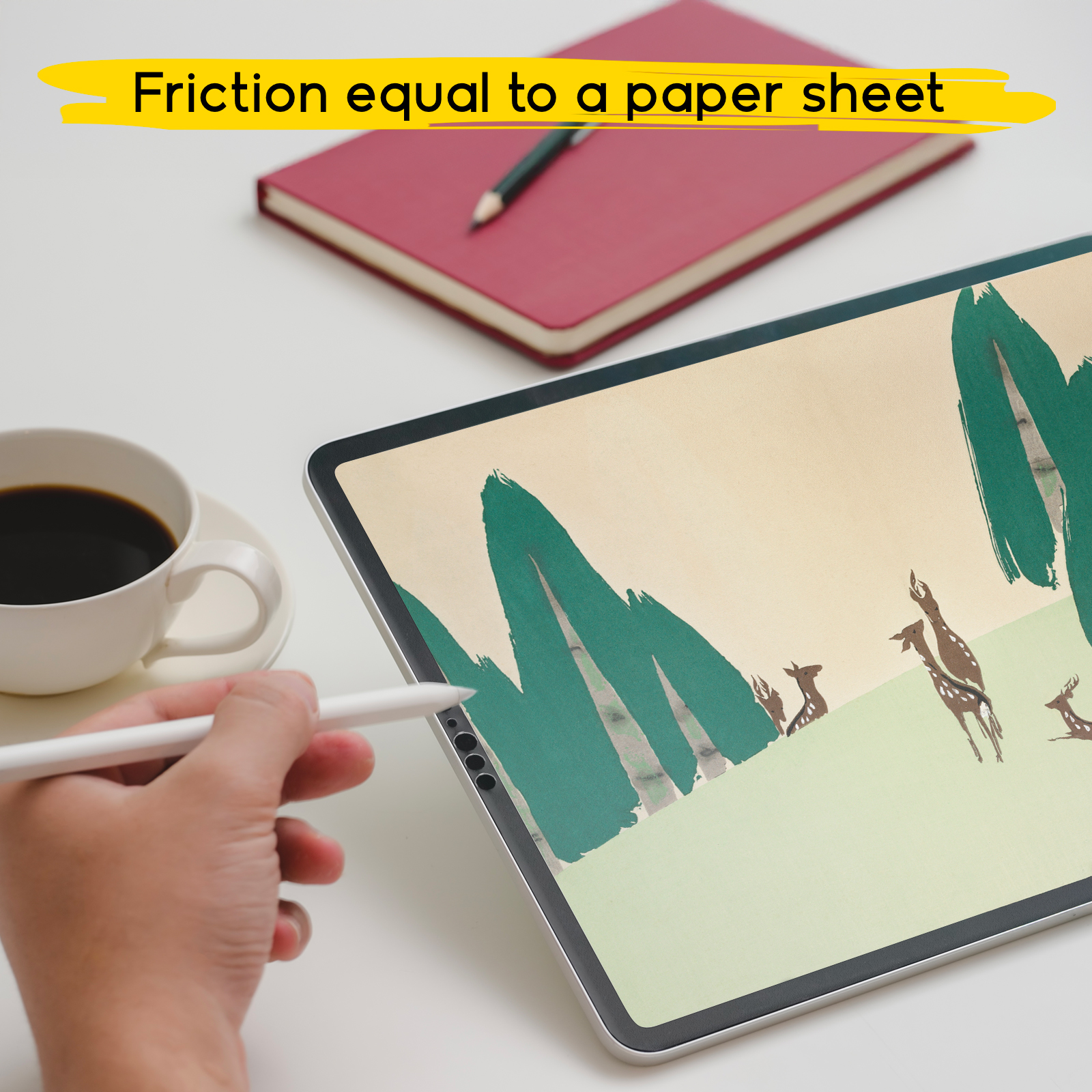 Persona dibujando ciervos en una tablet con lápiz; taza de café y cuaderno rojo cerca.