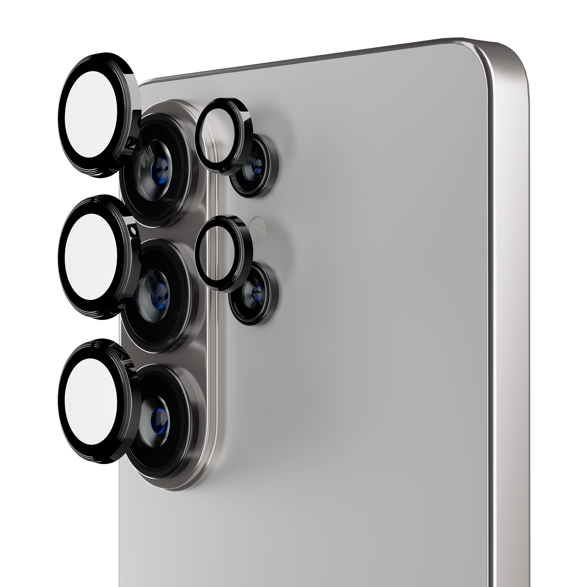 Parte trasera de un smartphone plateado con múltiples anillos protectores de lentes negros, algunos desmontados.