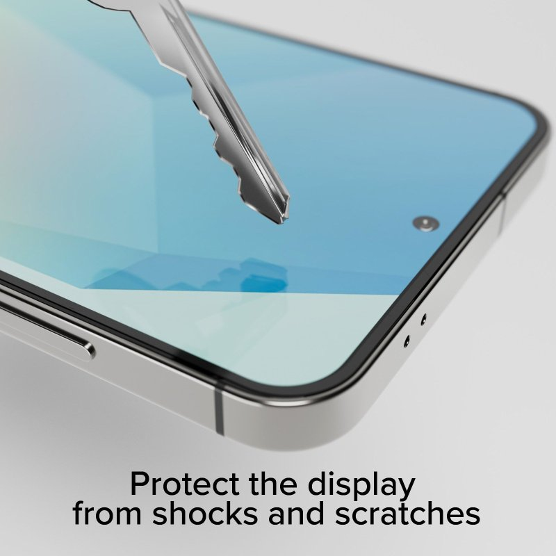 Una llave plateada raspa la pantalla de un smartphone. Texto abajo: Protect the display from shocks and scratches