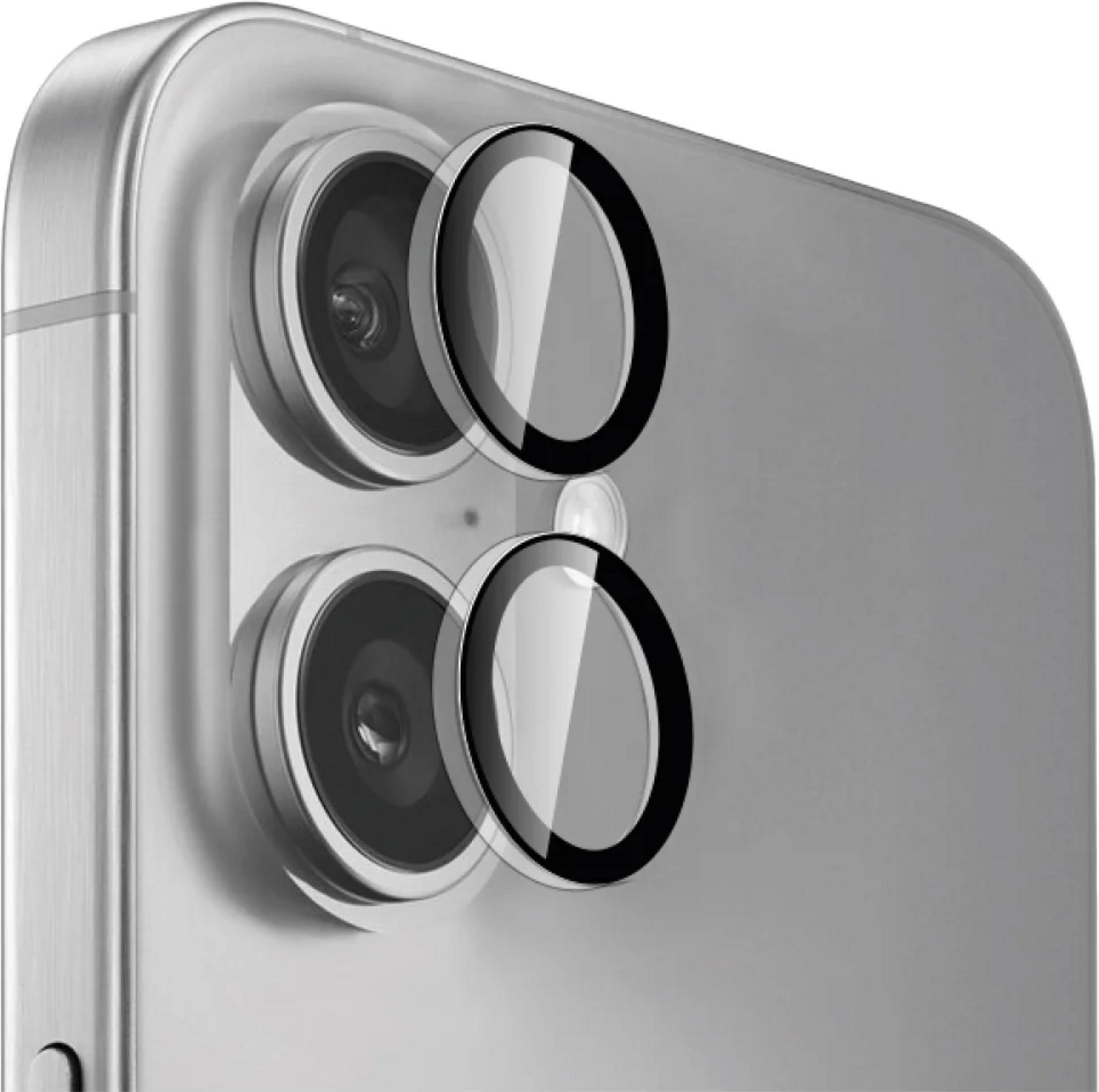 Primer plano de la cámara trasera de un teléfono inteligente con dos cubiertas de lentes protectoras redondas.