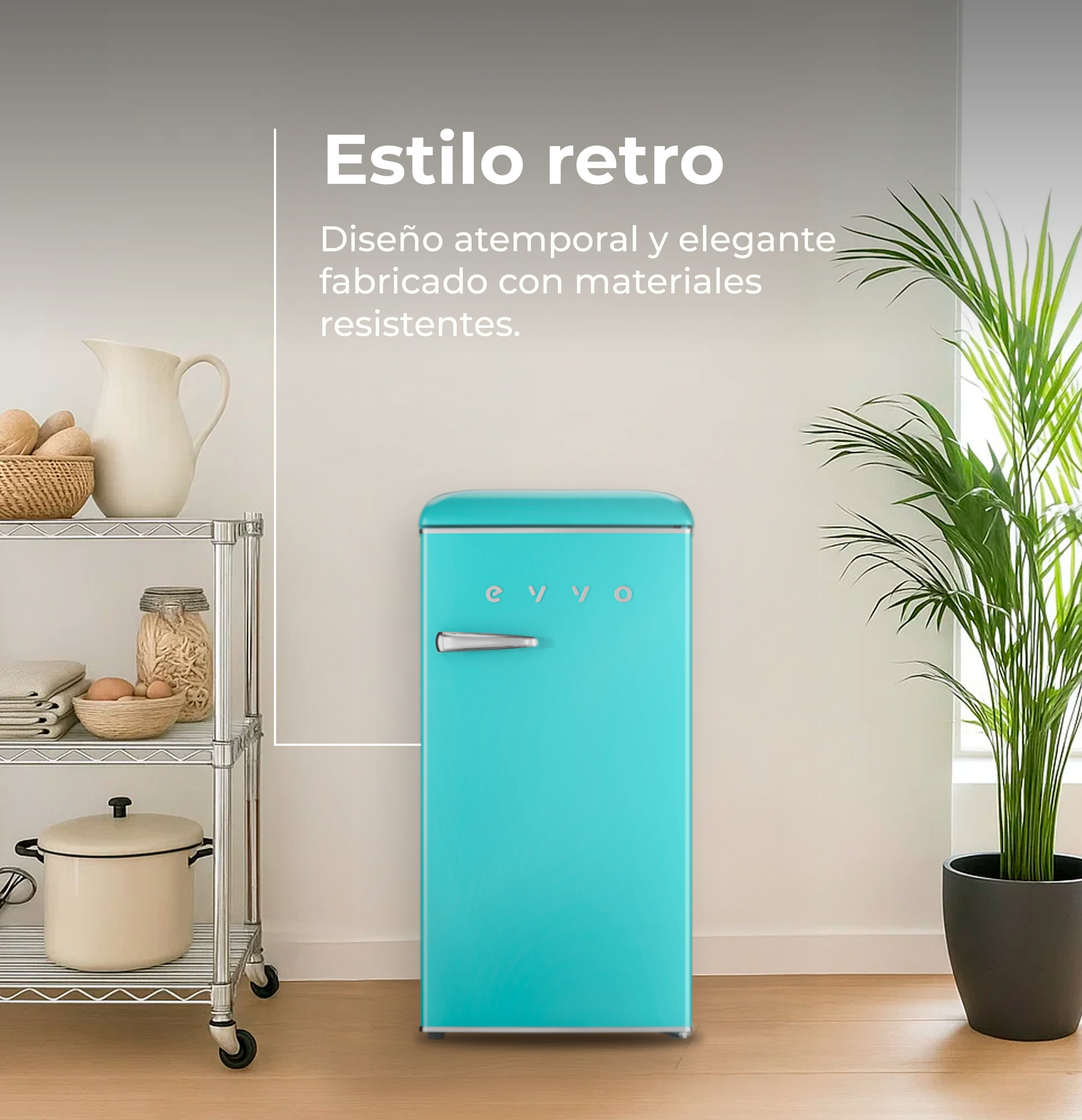 Una nevera retro turquesa en una cocina luminosa junto a una estantería metálica y una planta verde.
