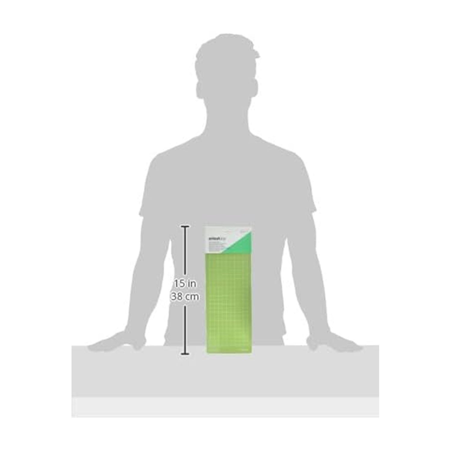 Graue Silhouette einer Person mit einer grünen Schneidematte mit einer Länge von 15 Zoll oder 38 cm.