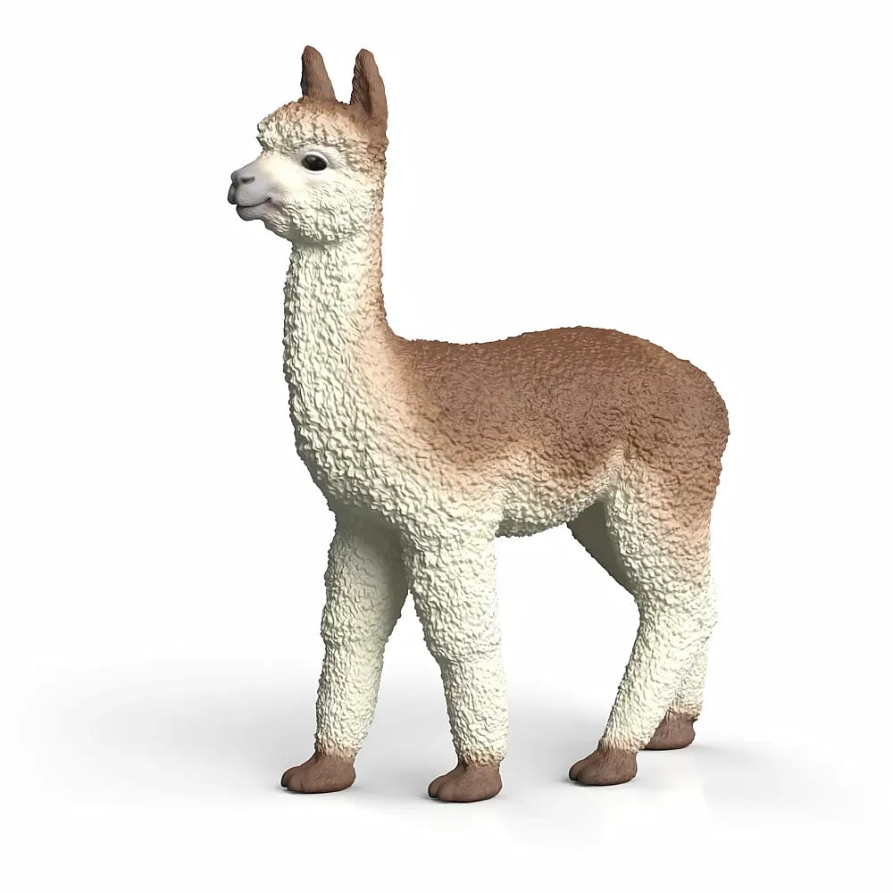 Eine Spielzeugfigur eines braun-weißen Alpakas vor weißem Hintergrund.