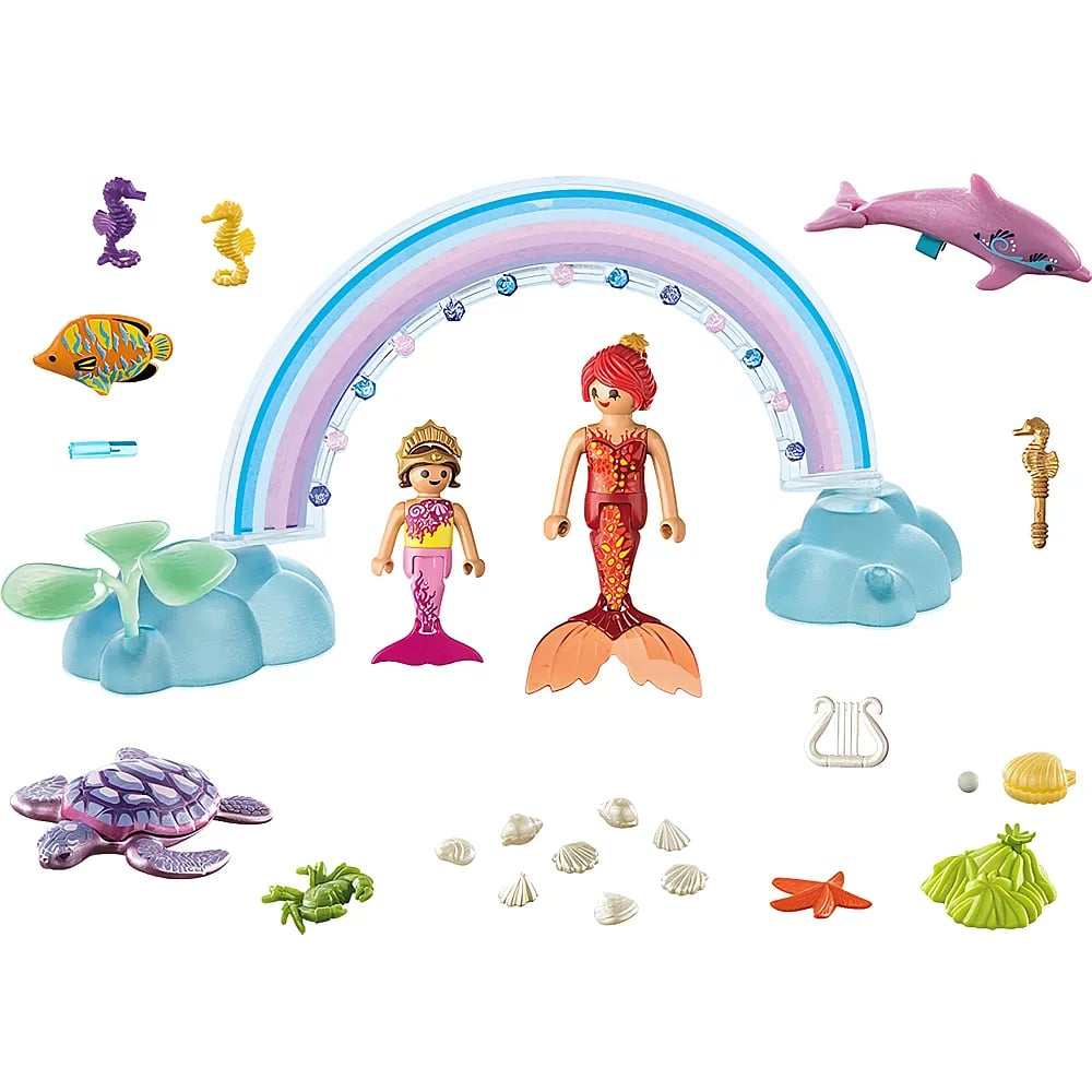 Playmobil-Meerjungfrauen-Set mit Regenbogen, Delfin, Schildkröte, Muscheln und Fischen auf weißem Hintergrund.