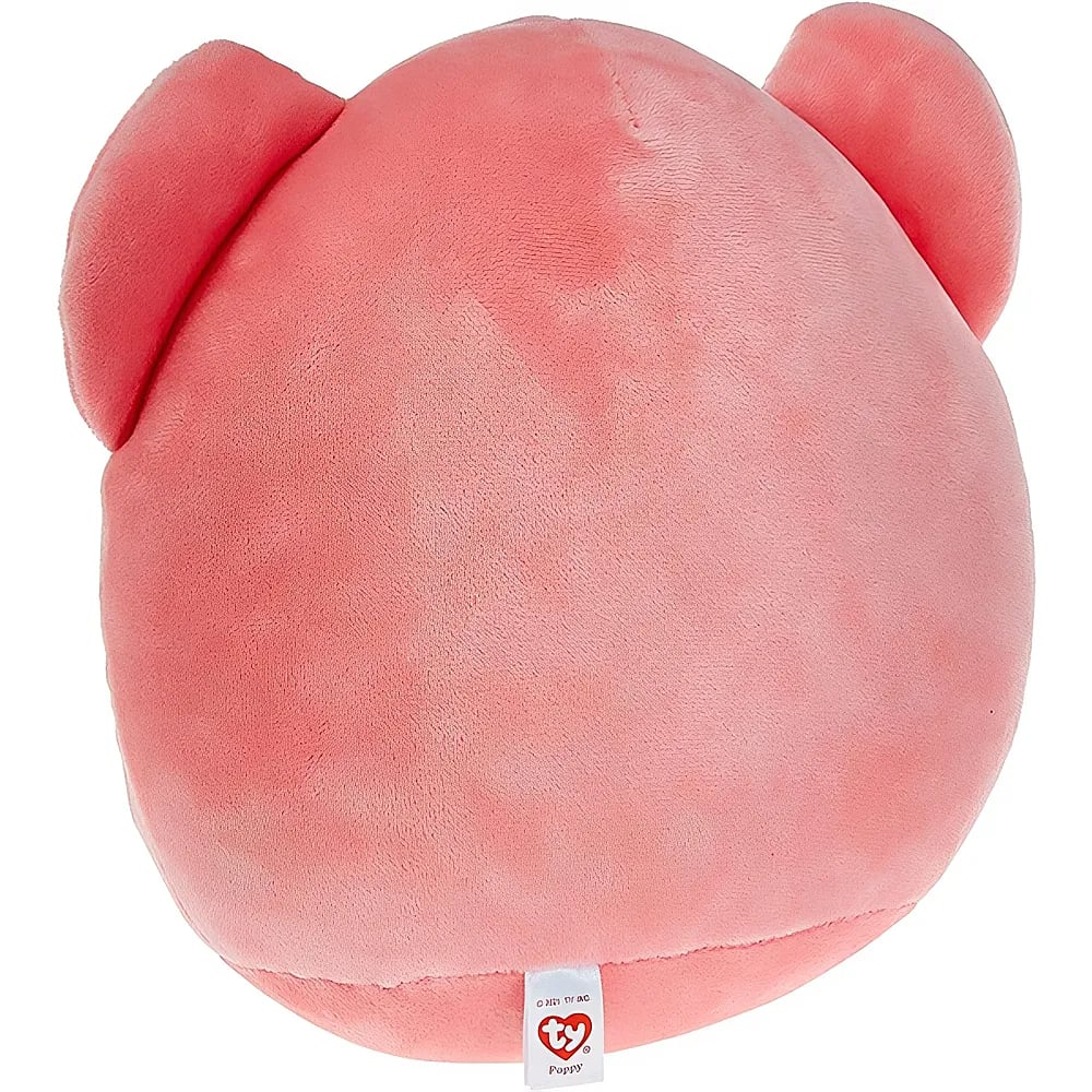Rückseite eines runden, rosafarbenen Kuscheltiers mit zwei Ohren und einem kleinen Etikett unten.
