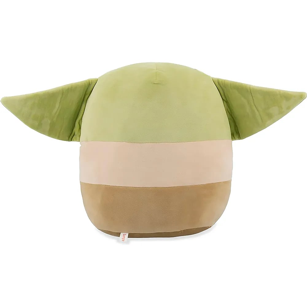 Un oreiller en peluche vert avec de grandes oreilles sur fond blanc.