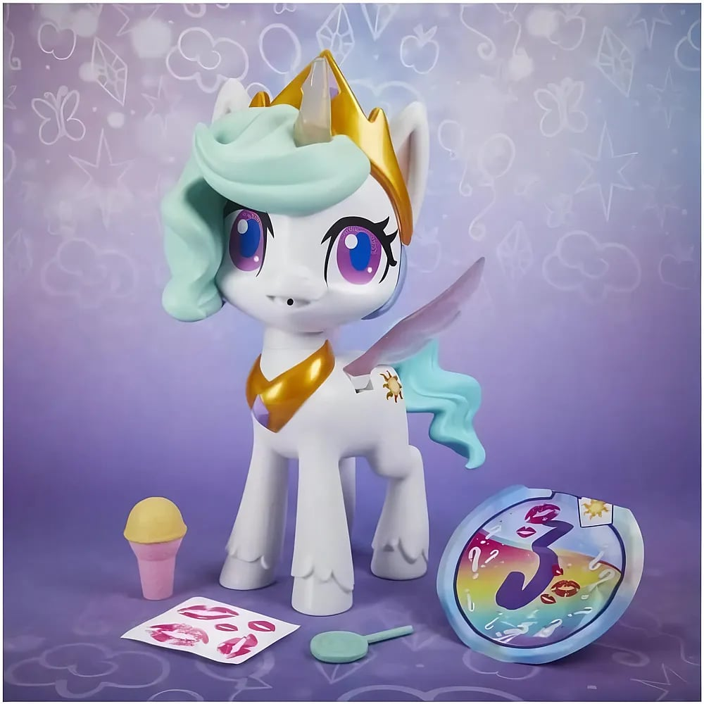 Un unicorno bianco con corona, grandi occhi viola, capelli verde menta e accessori su sfondo viola.