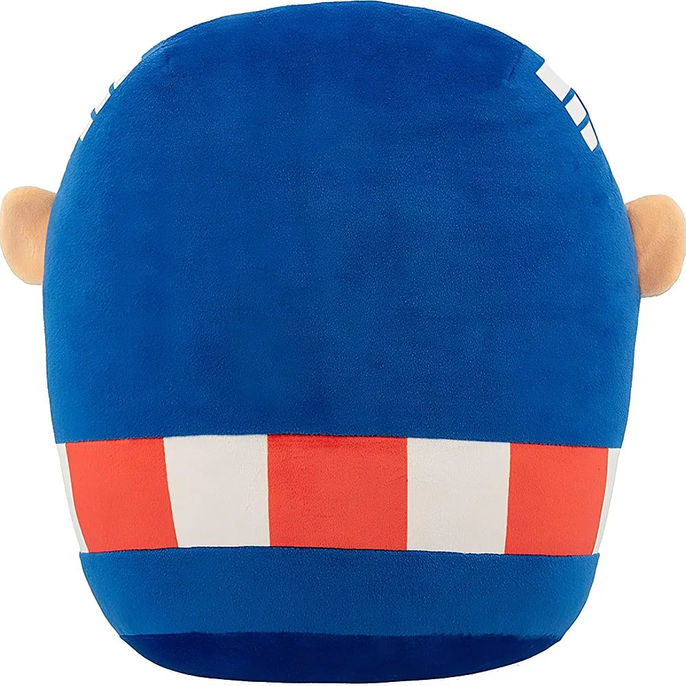 Blaue Plüschfigur mit roten und weißen Streifen unten und Ohren an den Seiten.