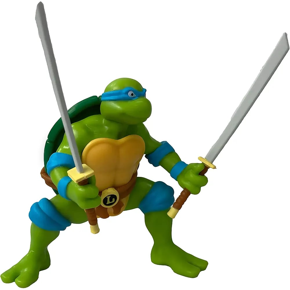 Una figura de acción de tortuga ninja verde con dos espadas.