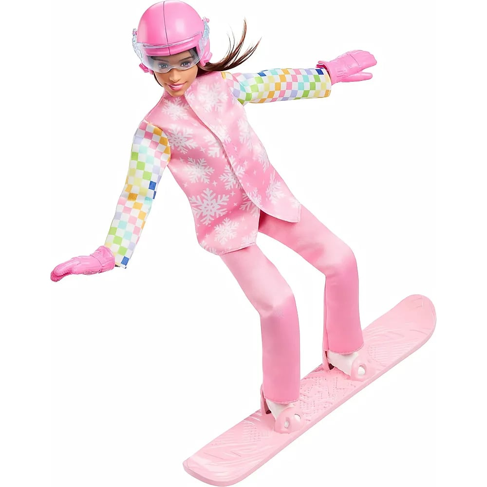 Eine pinke Barbie-Puppe in Skikleidung mit Helm und Handschuhen fährt auf einem pinken Snowboard.