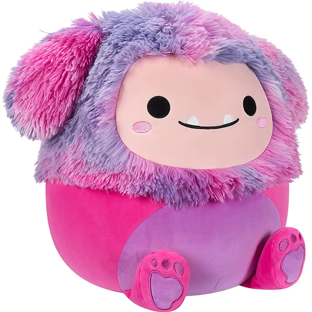 Un yéti en peluche rond et duveteux avec de la fourrure rose et violette, des yeux noirs et des pattes roses.