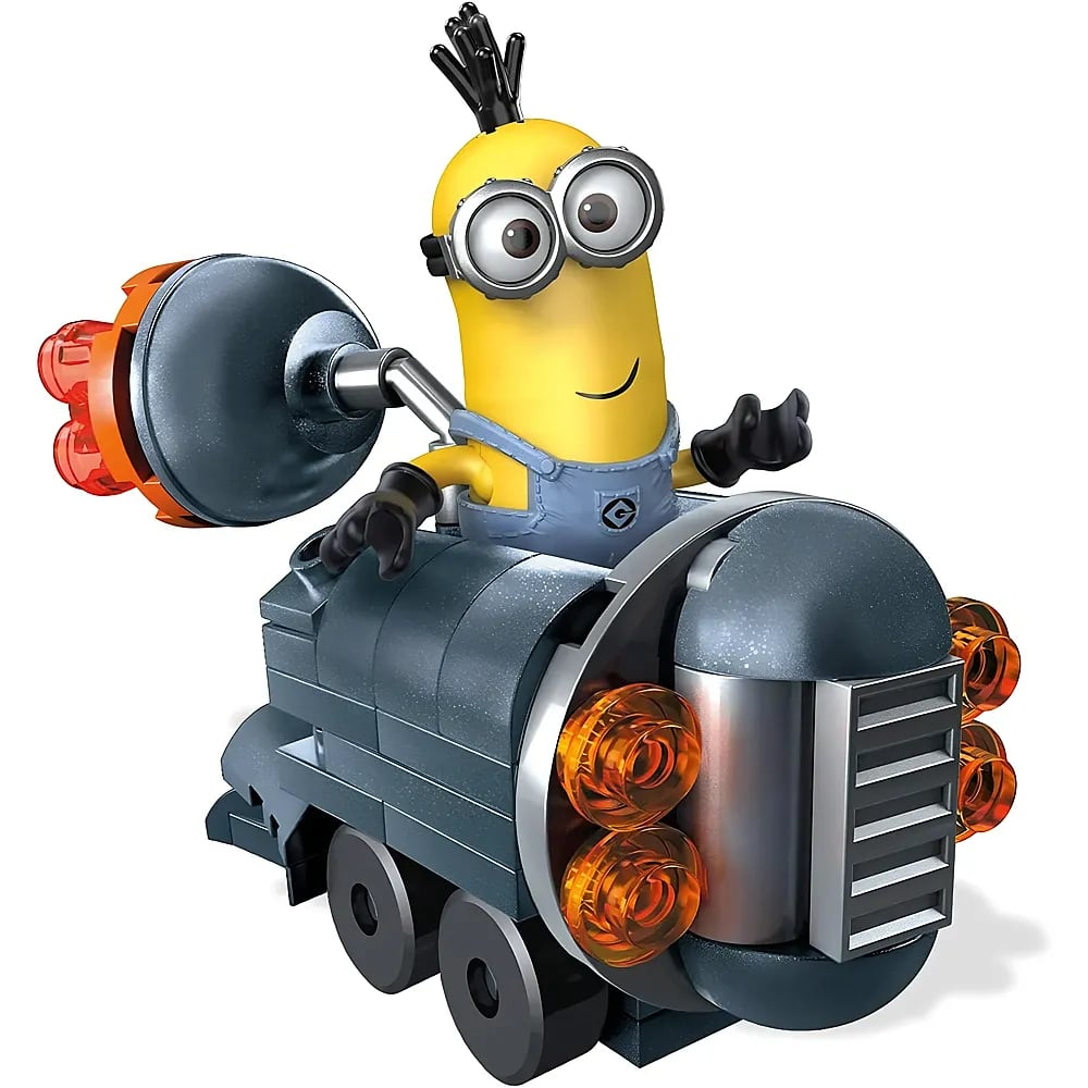 Un minion giallo con gli occhiali seduto in un veicolo Lego grigio con fiamme arancioni.